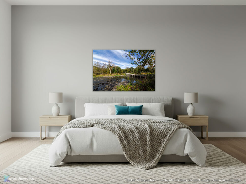Swayback Bridge at Ramsey Park canvas print hanging on neutral colored bedroom wall.