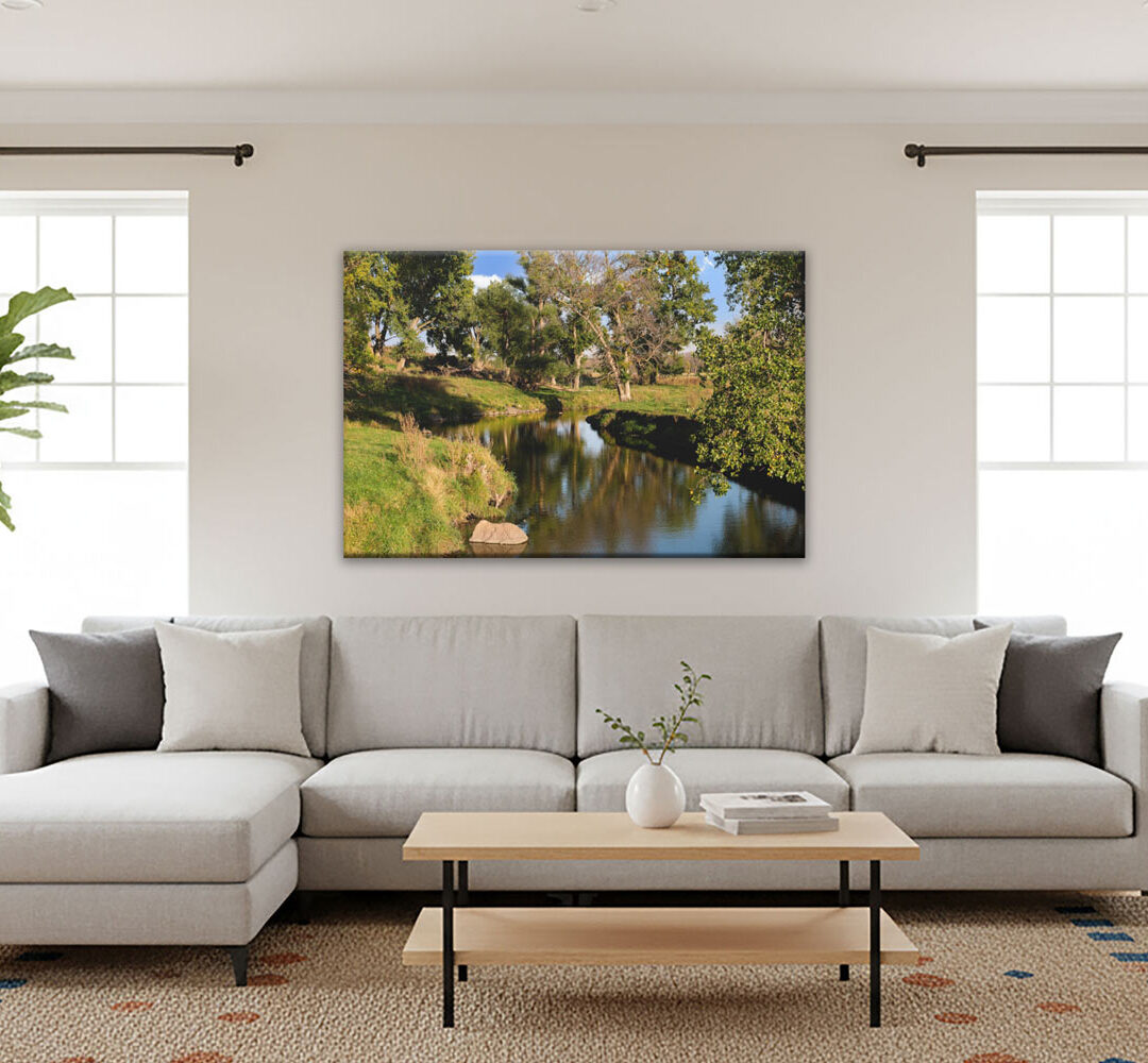 Reflective Prairie River Southwestern Minnesota Prairie Art canvas frame in living room.
